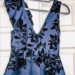 Dark blue crop shirt and tan pencil skirt